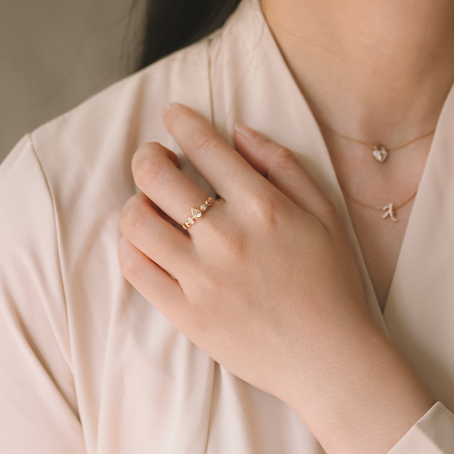 Bezel pear diamond ring